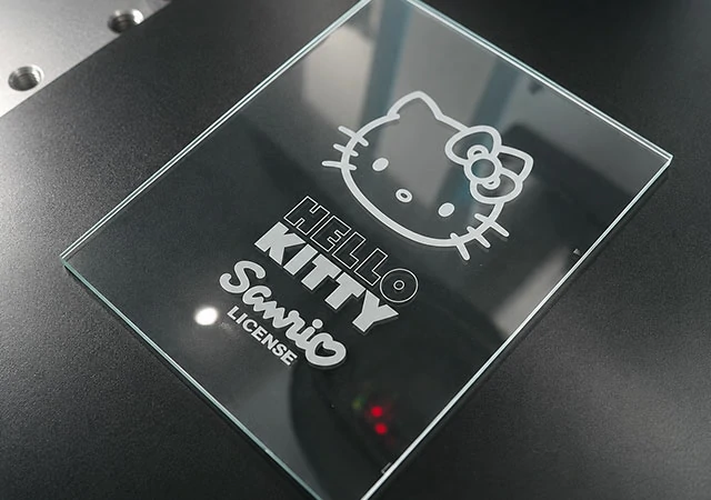 CO2 laser engraved glass with frosted white marking