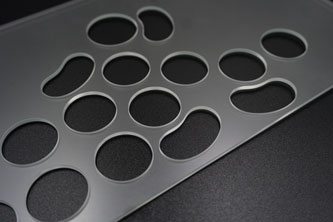 Precision drilling on glass